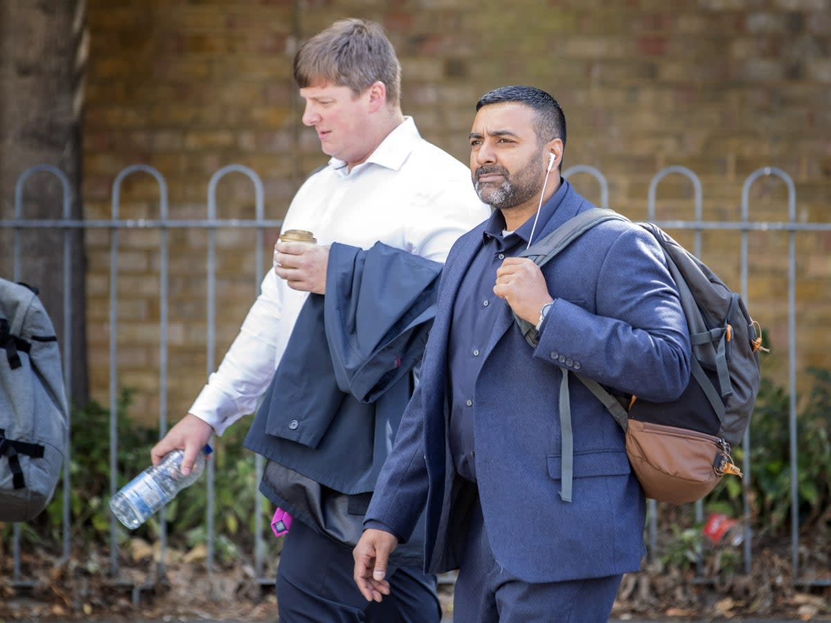 PC Sukhdev Jeer (right) and PC Paul Hefford have been dismissed from the Met Police (PA)