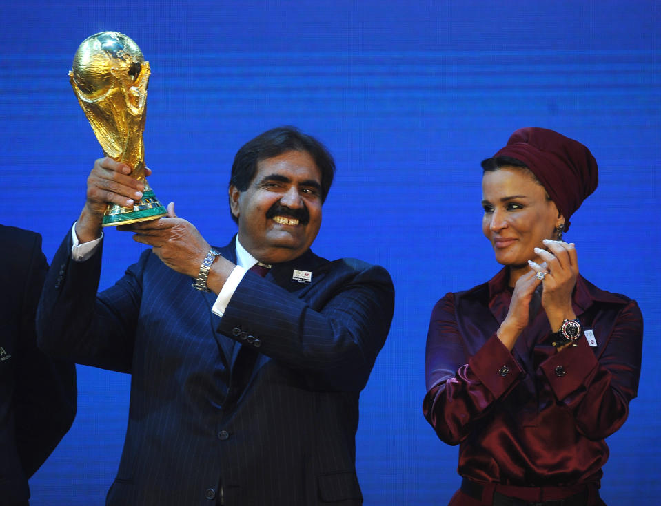 The Emir of Qatar celebrates their winning World Cup bid. (Credit: Getty Images)