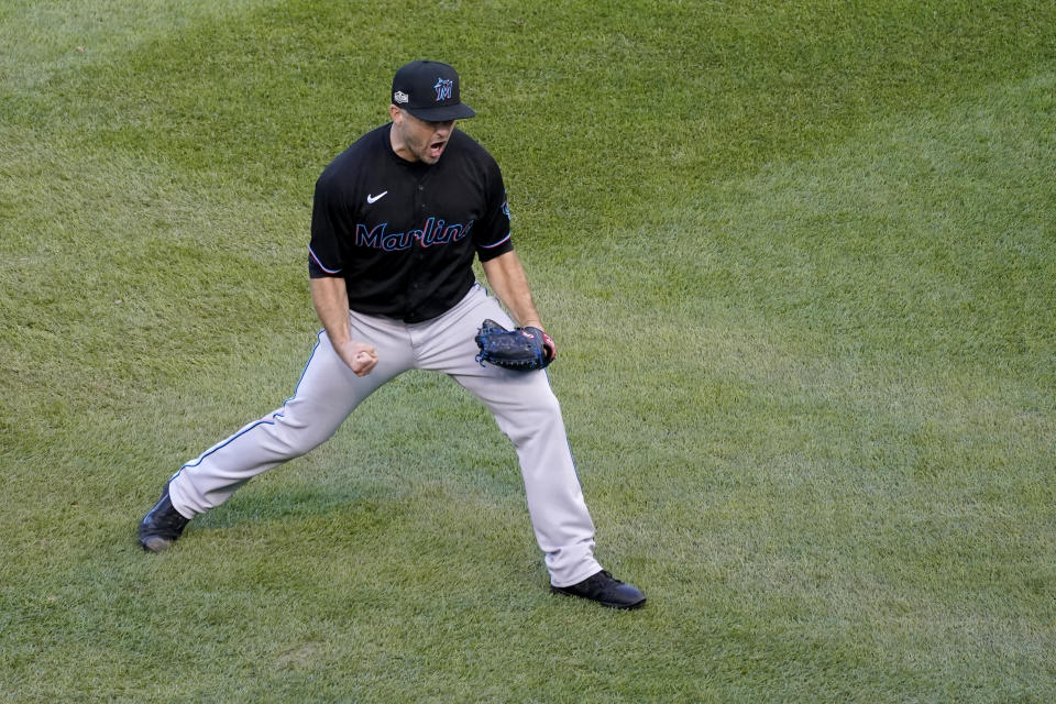 Miami Marlins relief pitcher Brandon Kintzler celebrates a 2-0 victory over the Chicago Cubs in Game 2 of a National League wild-card baseball series Friday, Oct. 2, 2020, in Chicago. The Marlins won the series 2-0 to advance to the division series. (AP Photo/Nam Y. Huh)