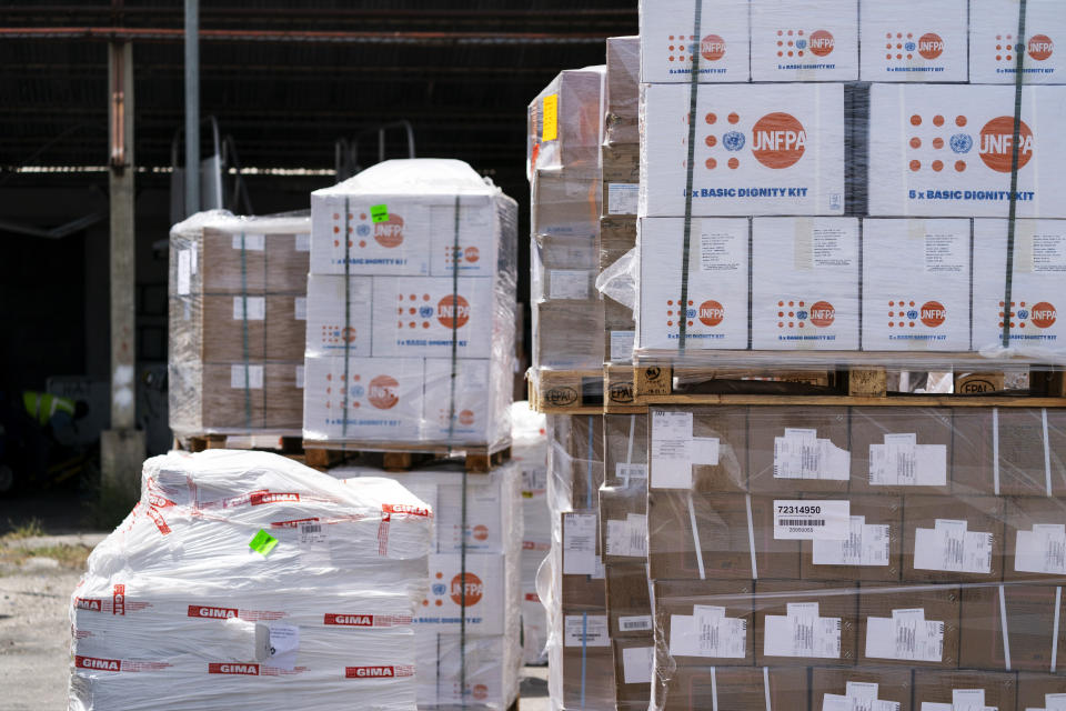 Pallets of aid wait to be loaded at Toussaint Louverture International Airport, Saturday, Aug. 28, 2021, in Port-au-Prince, Haiti. The VMM-266, "Fighting Griffins," from Marine Corps Air Station New River, from Jacksonville, N.C., are flying in support of Joint Task Force Haiti after a 7.2 magnitude earthquake on Aug. 22, caused heavy damage to the country. (AP Photo/Alex Brandon)