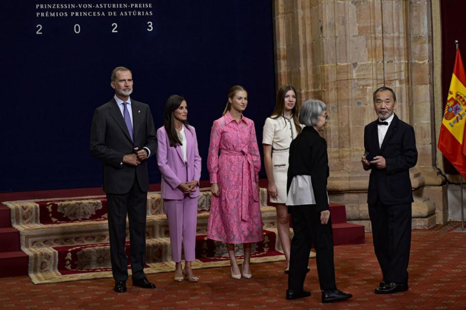 Japanese author Haruki Murakami, right, after receiving an emblem from the Spanish Royal family during the Princess of Asturias awards.