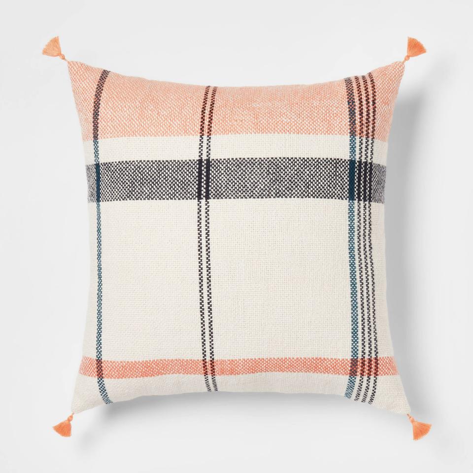 <h2>Threshold Oversized Woven Plaid Square Throw Pillow</h2><br>One way to make your sofa look extra cozy is to bury it under a canopy of cushions and blankets. This large throw pillow, with a classic plaid pattern and versatile color scheme, is a great starting point.<br><br><em>Shop </em><a href="https://bonsai.to/kni" rel="nofollow noopener" target="_blank" data-ylk="slk:Threshold" class="link "><em><strong>Threshold</strong></em></a><br><br><strong>Threshold</strong> Woven Plaid Square Throw Pillow, $, available at <a href="https://go.skimresources.com/?id=30283X879131&url=https%3A%2F%2Fbonsai.to%2Fkni" rel="nofollow noopener" target="_blank" data-ylk="slk:Target" class="link ">Target</a>