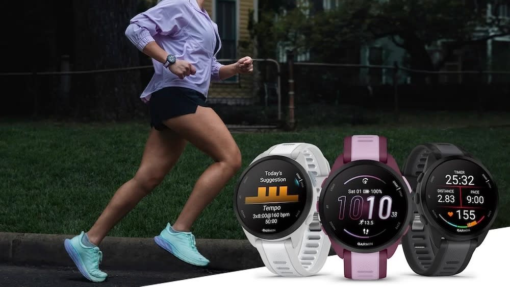  Garmin's hero image on its press release for the Forerunner 165, showing a woman running while wearing the watch, plus three renders of the Forerunner 165 in the bottom-right corner showing a daily workout suggestion, the main watch face, and the data fields showing during a running activity. . 