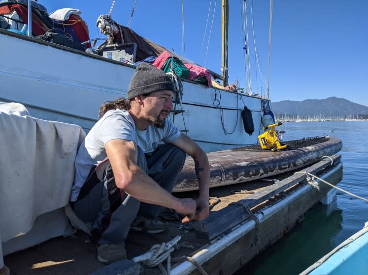 Chad Wycliffe on the Vadura, a historic, nearly century-old teak yacht that's moored in Richardson Bay. Wycliffe, who's been living on the bay on and off since he was a teenager, is one of a handful of anchor outs who have been arrested in recent months after confronting authorities who are trying to remove illegally moored vessels from the water.