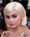 <p>The beauty entrepreneur switched up her natural brunette hair with a bleached blonde bob wig.</p>