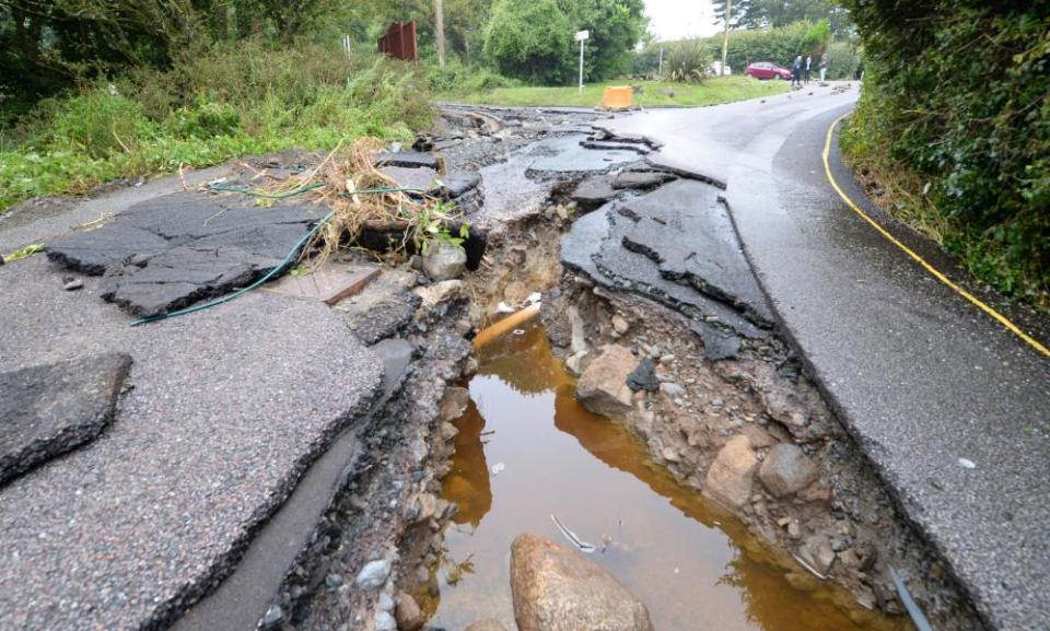 A damaged road in Coverack, Cornwall, after intense rain caused flash flooding in the coastal village