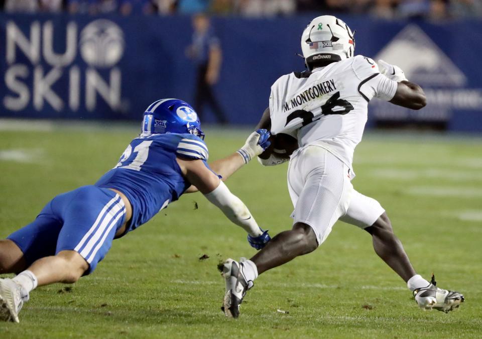 The Brigham Young Cougars play the Cincinnati Bearcats in the second half of a football game at LaVell Edwards Stadium in Provo on Friday, Sept. 29, 2023. BYU won 35-27. | Kristin Murphy, Deseret News
