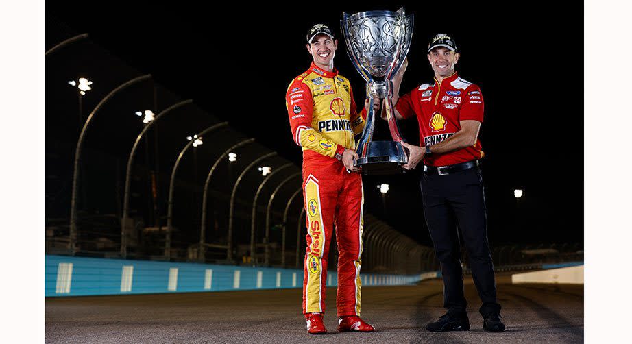 Crew chief Paul Wolfe and Joey Logano celebrate their first Cup Series championship together at Phoenix Raceway