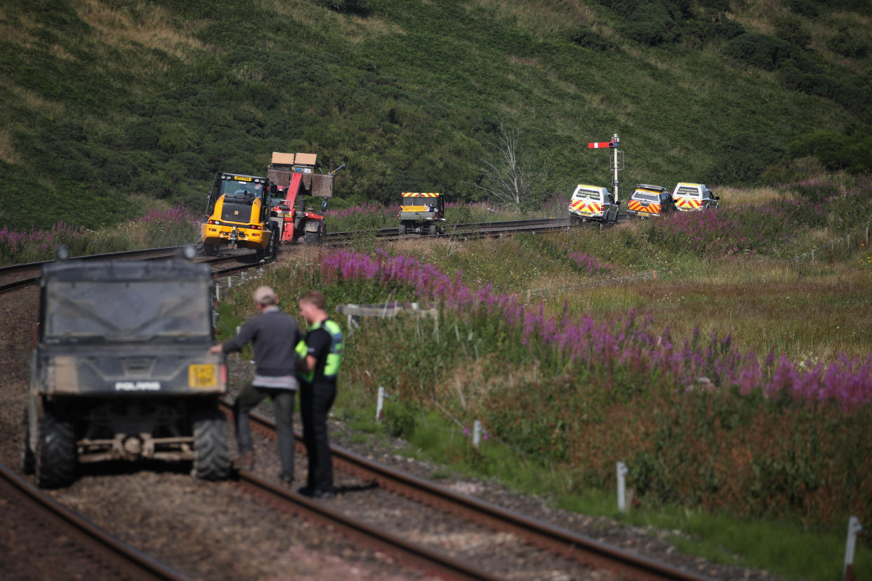 Emergency vehicles at the scene. (PA Images)