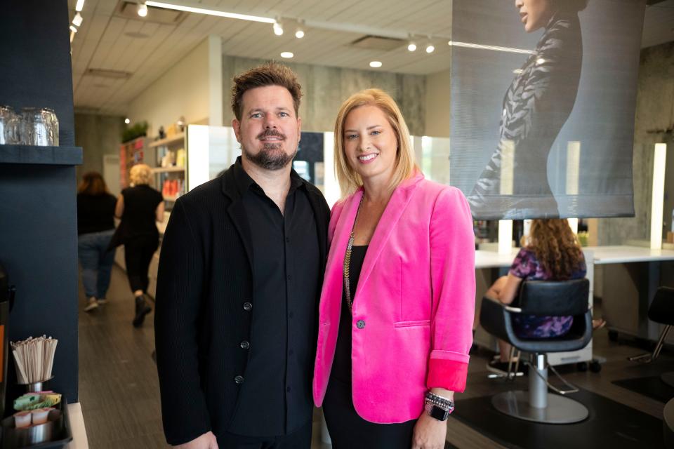 Chris and Jenny Knudsen, owners of Mane Attraction, pictured at their hair salon.