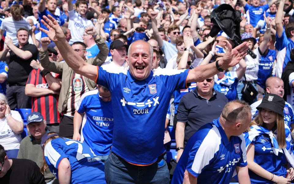 Ipswich fans celebrate promotion to the Premier League