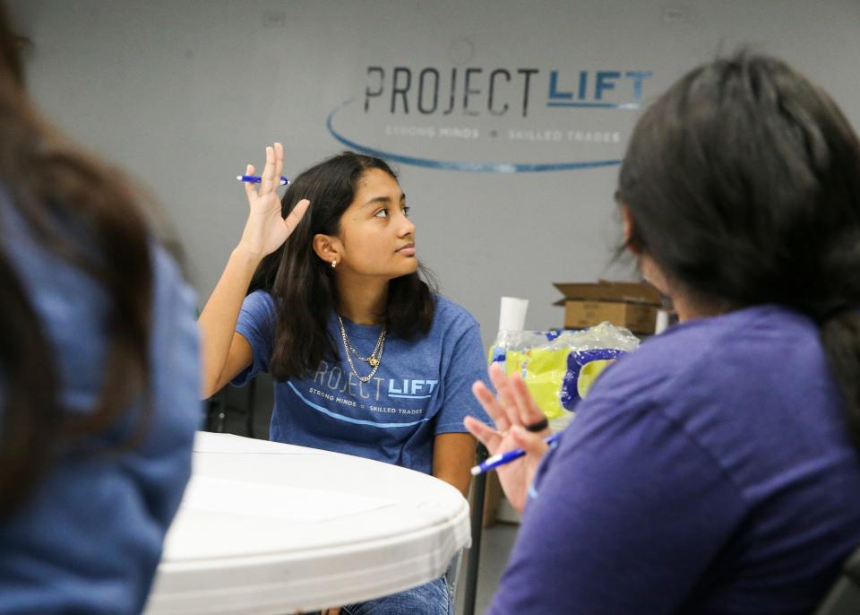 "It's nice to know that they can talk to someone their own age. It's a proud moment," said Project LIFT graduate Valerie Aplicano, 14, who raises her hand during the nutrition class while volunteering as a mentor at the nonprofit Tuesday, Aug. 2, 2022, in Palm City. The organization provides substance abuse treatment, mental health counseling and vocational skills training to teens ages 14 to 19.
