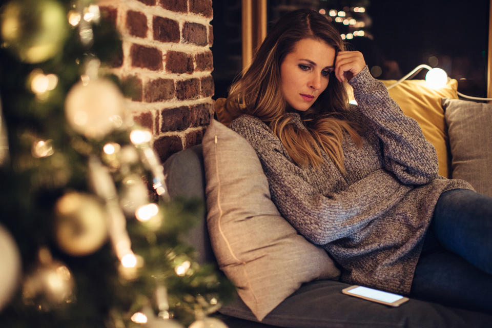 Many people are set to experience heightened feelings of stress during the holidays due to COVID-19. Here's how you can help improve your mental health during the holiday season. (Image via Getty Images). 