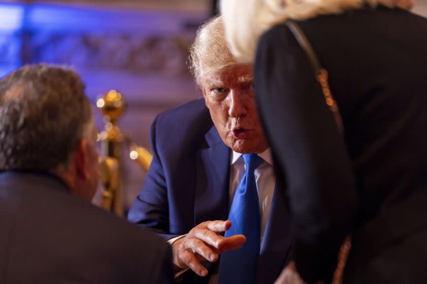 Former President Donald Trump speaks to guests at Mar-a-lago on Election Day, Tuesday, Nov. 8, 2022, in Palm Beach, Fla. (AP Photo/Andrew Harnik)