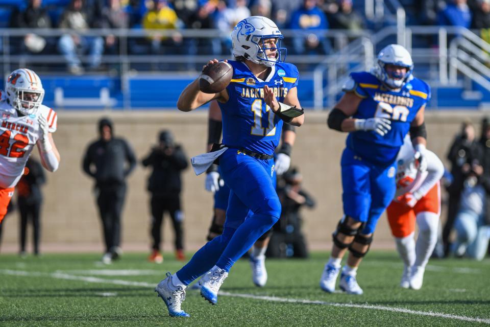 SDSU's quarterback Mark Gronowski (11) runs with the ball during a game against Mercer University on Saturday, Dec. 2, 2023 at Dana J Dykhouse Stadium in Brookings.