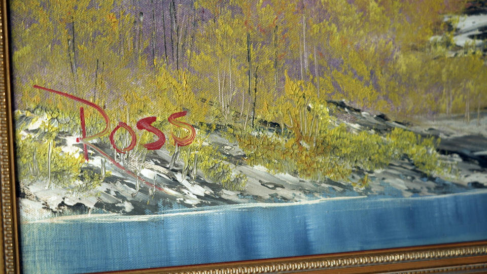 "A Walk in the Woods," the first painting Bob Ross produced for hic iconic show “The Joy of Painting,” sits on display at the home of Modern Artifact owner Ryan Nelson, Tuesday, Sept. 19, 2023, in Wayzata, Minn. Ross was known for his unpretentious approach to painting on his long-running show, “The Joy of Painting,” but now the painting he completed on his first show in 1983 is for sale for nearly $10 million. Minneapolis gallery owner Ryan Nelson calls it the "rookie card" for Ross. (AP Photo/Mark Vancleave)