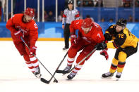 <p>Dominik Kahun #72 of Germany competes for the puck against Ilya Kablukov #29 and Ivan Telegin #7 of Olympic Athlete from Russia in the third period during the Men’s Gold Medal Game on day sixteen of the PyeongChang 2018 Winter Olympic Games at Gangneung Hockey Centre on February 25, 2018 in Gangneung, South Korea. (Photo by Jamie Squire/Getty Images) </p>