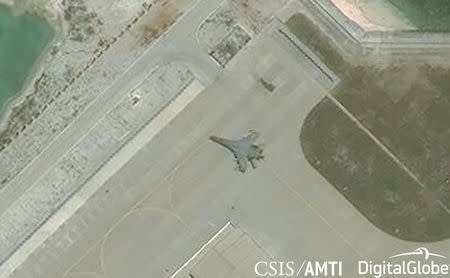 Satellite imagery shows what the CSIS Asia Maritime Transparency Initiative describes as the deployment of several new weapons systems, including a J-11 combat aircraft, at China’s base on Woody Island in the Paracels, South China Sea May 12, 2018.Courtesy CSIS Asia Maritime Transparency Initiative/DigitalGlobe/Handout via REUTERS