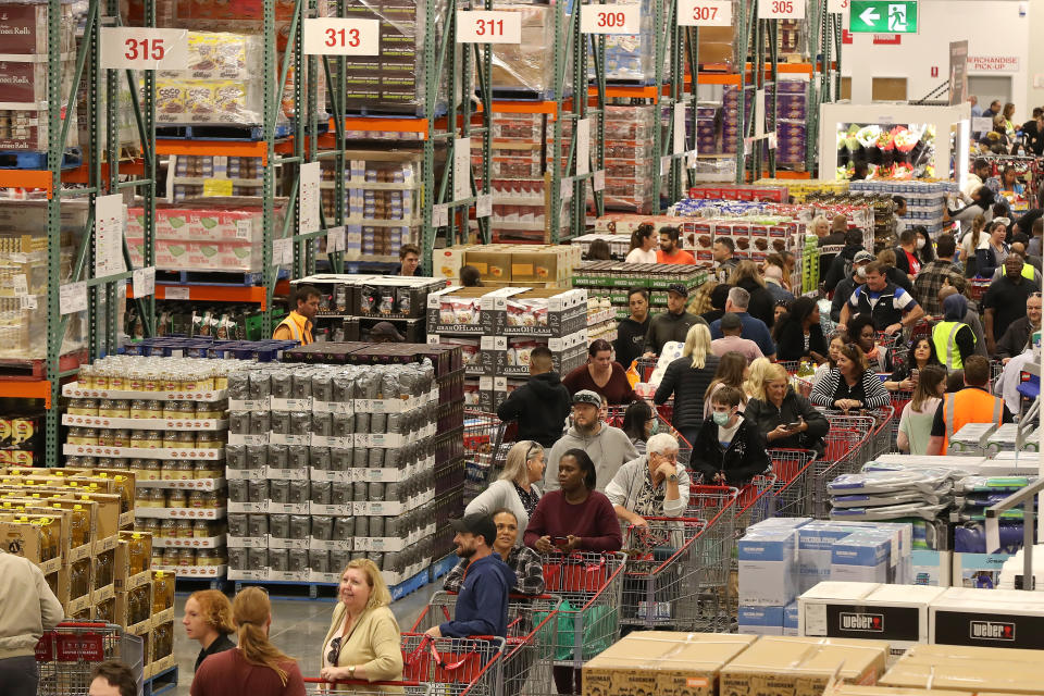 PERTH, AUSTRALIA - MARCH 19: Shoppers line the aisles at Costco Perth on March 19, 2020 in Perth, Australia. The store, which is the first Costco in Western Australia, is limiting toilet paper purchases to one packet per customer, in response to panic buying across Australia as fears over the COVID-19 pandemic grow. There are 596 confirmed cases of COVID-19 In Australia and 20 confirmed deaths,. (Photo by Paul Kane/Getty Images)