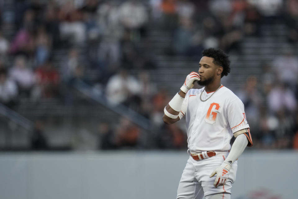 San Francisco Giants' Luis Matos reacts after hitting an RBI double against the Cincinnati Reds during the second inning of a baseball game Tuesday, Aug. 29, 2023, in San Francisco. (AP Photo/Godofredo A. Vásquez)