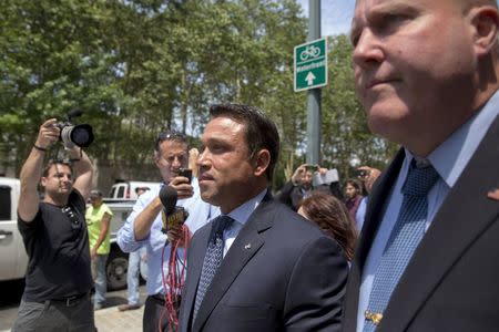 Former U.S. Representative Michael Grimm (R-NY) exits the Brooklyn Federal Courthouse in the Brooklyn Borough of New York July 17, 2015. REUTERS/Brendan McDermid