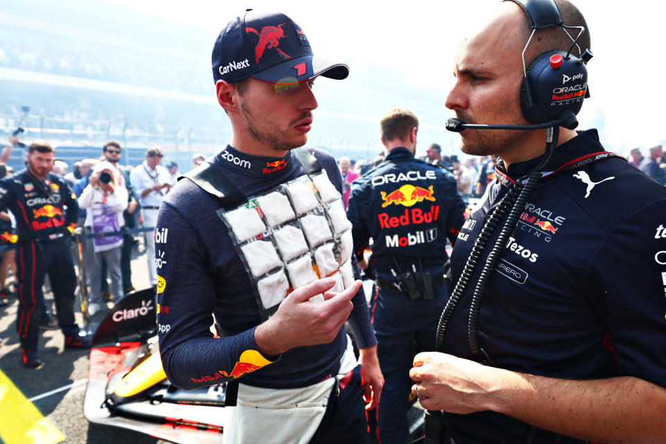 Pictured left to right, Red Bull driver Max Verstappen talks with race engineer Gianpiero Lambiase on the grid at the Mexico GP. 