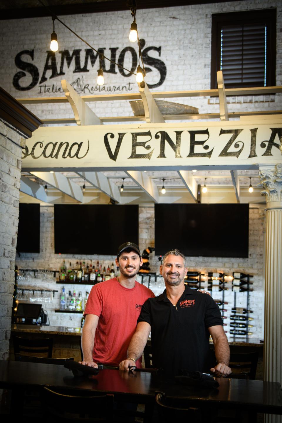 Louis Frangos, right, with his son, Sam Frangos, at Sammio’s Italian Restaurant in Hope Mills.
