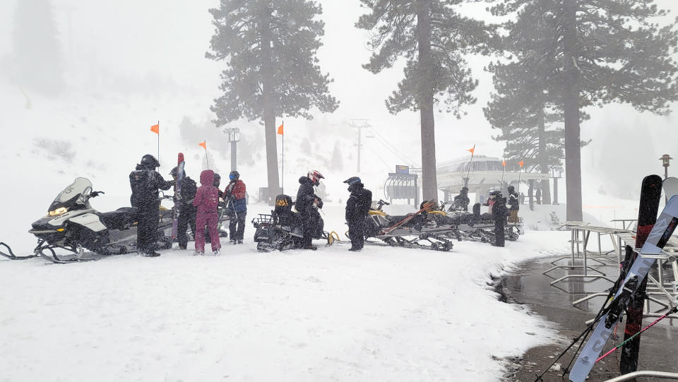 Rescues crews work at the scene of an avalanche at the Palisades Tahoe ski resort on Wednesday, Jan. 10, 2024, near Lake Tahoe, Calif. The avalanche roared through a section of expert trails at the ski resort as a major storm with snow and gusty winds moved into the region, authorities said. (Mark Sponsler via AP)