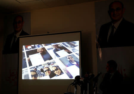 The media office of Egyptian human rights lawyer and opposition leader Khaled Ali show them supporters with them signs during a news conference about the upcoming 2018 presidential elections, in Cairo, Egypt January 17, 2018. REUTERS/Amr Abdallah Dalsh