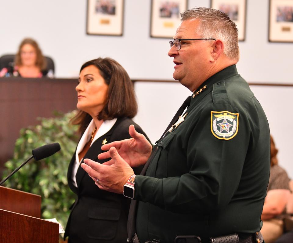 Sheriff Wayne Ivey and BCSO attorney Laura Moody answer questions from the Brevard County Commission at a meeting where commissioners discussed restrictions on individuals standing, sitting, or remaining near the off-ramps of I-95 and arterial and collector roads.