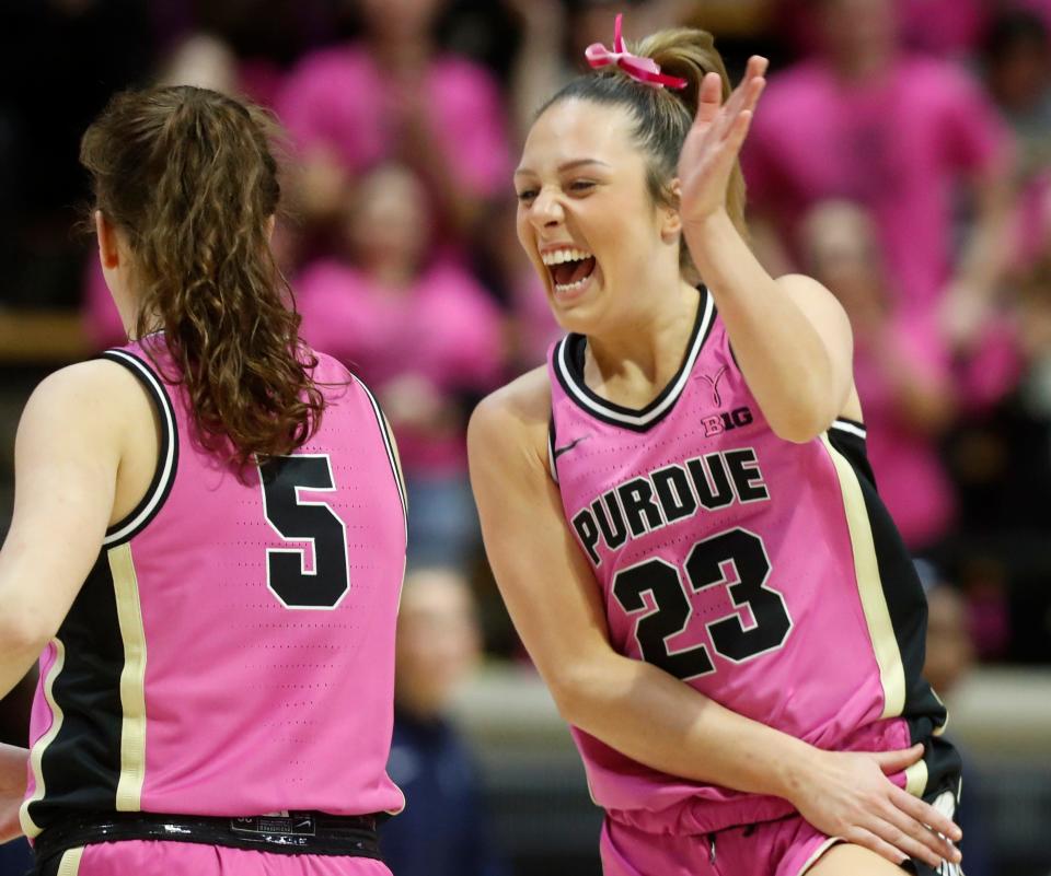 Purdue Boilermakers guard Abbey Ellis (23) goes to celebrate with Purdue Boilermakers guard Cassidy Hardin (5) during the NCAA women’s basketball game against the Penn State Nittany Lions, Wednesday, Feb. 22, 2023, at Mackey Arena in West Lafayette, Ind. Purdue won 86-62.