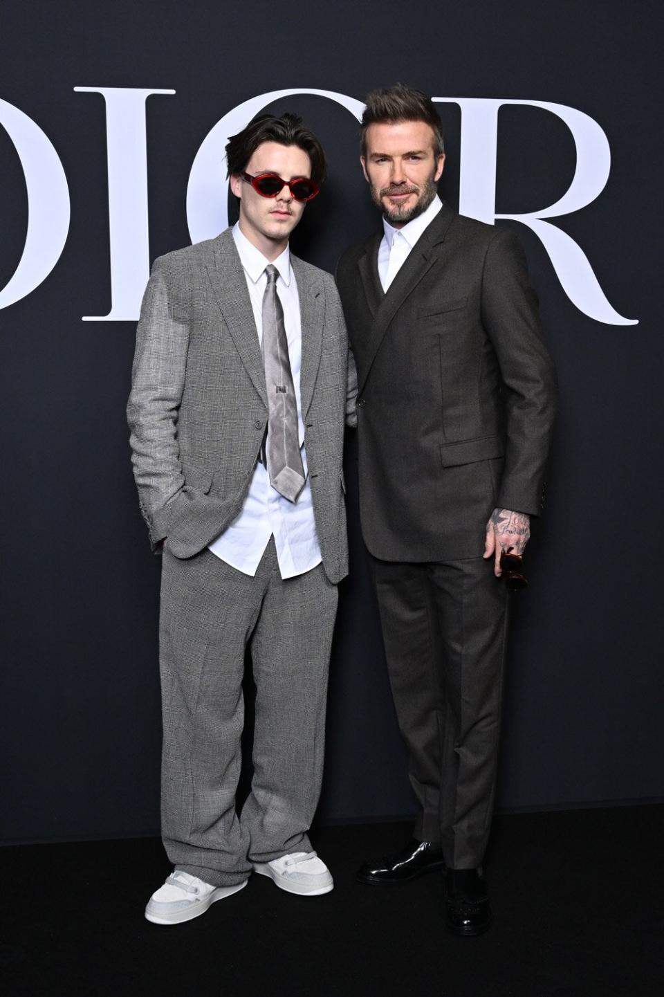 Robert Pattison and Beckham Boys Attend Dior PFW Show