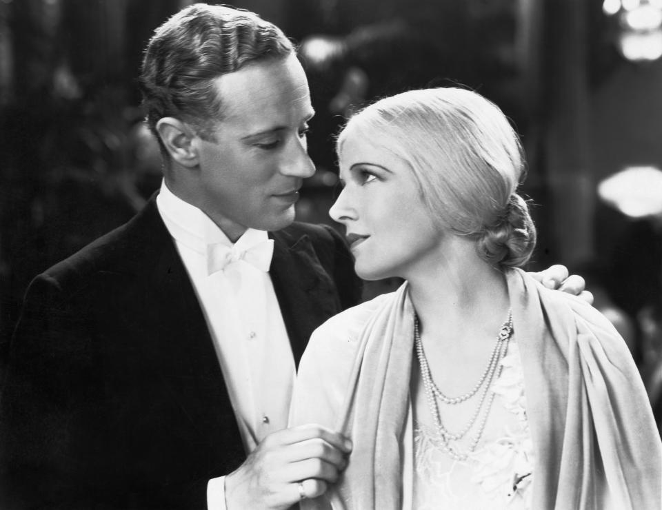 David Trent (Leslie Howard) and Shirley Mortimer (Ann Harding) gaze into each other's eyes in the 1931 romantic comedy Devotion. (Photo by �� John Springer Collection/CORBIS/Corbis via Getty Images)