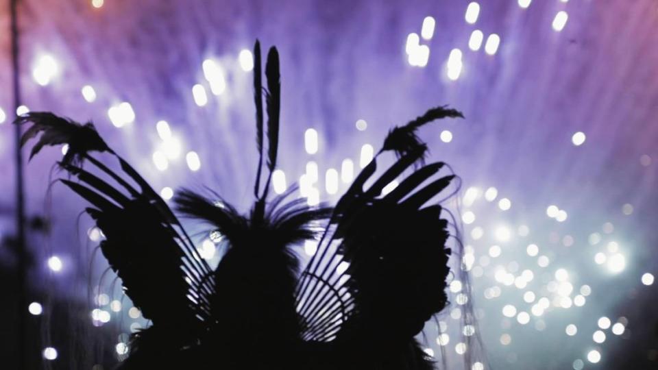 During a break in dancing, spectators watch as fireworks launch over the 47th Annual 4th of July Powwow on Saturday, July 1, 2023 in Cherokee, N.C.