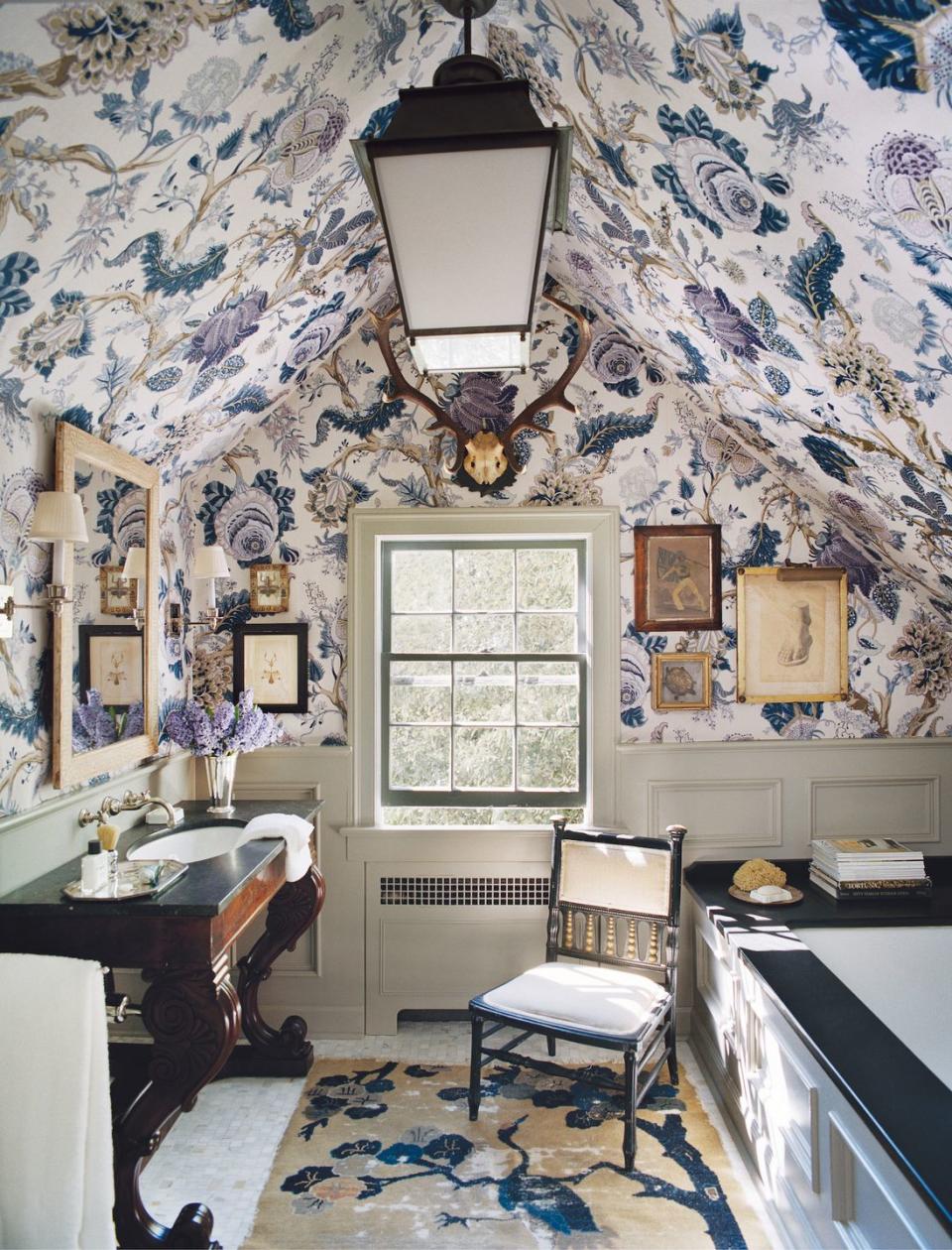 <p>If you think chintz never went out of style, you will most definitely fall in the classic camp. Always inspired and never stuffy, these more traditional spaces favor a more fanciful yet livable look. A bountiful <a href="https://www.veranda.com/home-decorators/a33301568/tree-of-life-pattern-history/" rel="nofollow noopener" target="_blank" data-ylk="slk:tree-of-life pattern;elm:context_link;itc:0;sec:content-canvas" class="link ">tree-of-life pattern</a> (Indian Abre) makes quite the statement within this quaint bathroom. </p>