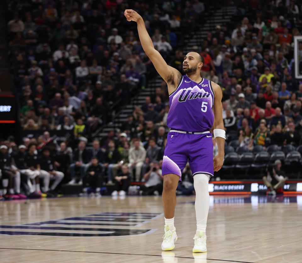 Utah Jazz guard <a class="link " href="https://sports.yahoo.com/nba/players/6234" data-i13n="sec:content-canvas;subsec:anchor_text;elm:context_link" data-ylk="slk:Talen Horton-Tucker;sec:content-canvas;subsec:anchor_text;elm:context_link;itc:0">Talen Horton-Tucker</a> (5) hits a 3-pointer against the Nets in Salt Lake City on Monday, Dec. 18, 2023. The Jazz won 125-108. | Jeffrey D. Allred, Deseret News