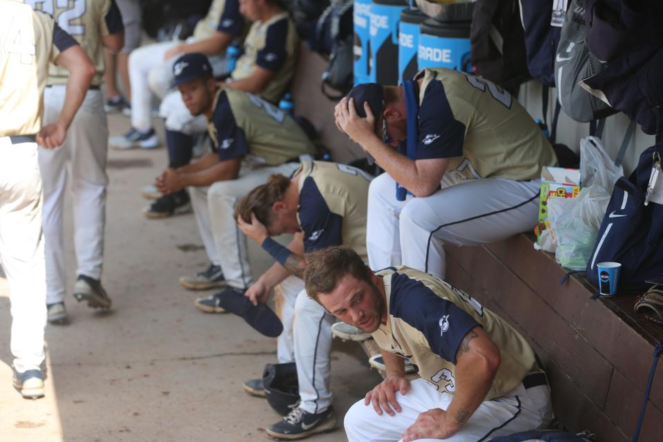 Illinois-Sprignfield baseball players show their dejection in the dugout after Monday's 3-2 loss in an elimination game to Rollins at the NCAA Division II national championships in Cary, North Carolina.