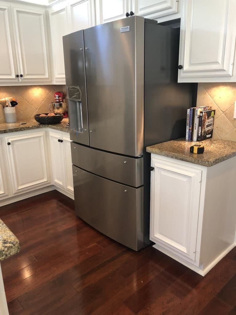 counter depth fridge flush to the front of counters in kitchen