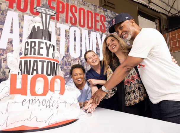 PHOTO: Grey's Anatomy stars Chandra Wilson, Ellen Pompeo and James Picken Jr. celebrate with showrunner Krista Vernoff the 400th episode of TVs longest-running primetime medical drama with a cake-cutting ceremony in Los Angeles, Monday, May 2, 2022. (Liliane Lathan/ABC via Getty Images)