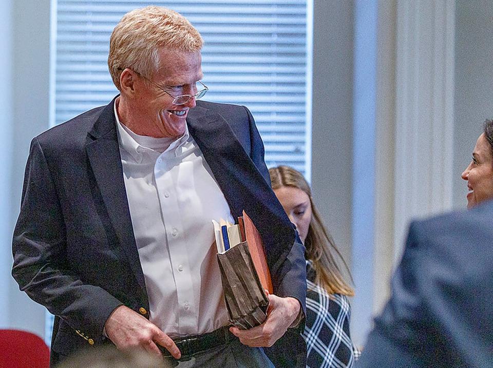 Alex Murdaugh walks into the Colleton County Courthouse for jury selection on 23 January (AP)