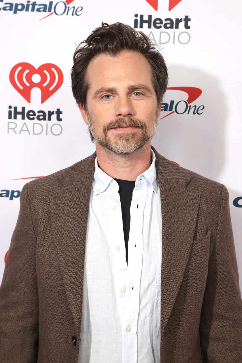 Closeup of an adult Rider Strong on the red carpet