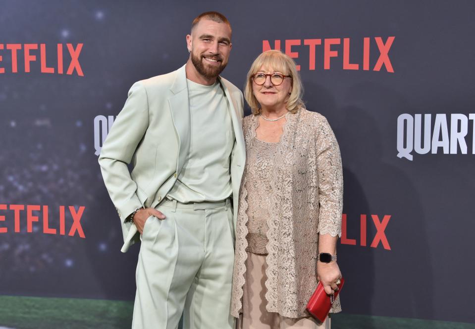 Kansas City Chief's football tight end Travis Kelce (L) and his mom Donna Kelce arrive for the premiere of Netflix's docuseries "Quarterback" 