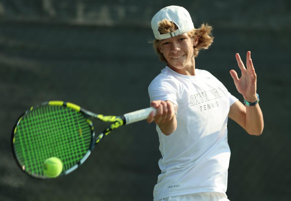 Skyridge’s Calvin Armstrong returns a ball as he plays Corner Canyon’s Alex Fuchs in the high school 6A boys state tennis championships at Liberty Park Tennis in Salt Lake City on Saturday, May 20, 2023. | Scott G Winterton, Deseret News