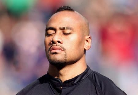 New Zealand's Jonah Lomu gathers his thoughts before the kick-off of the Rugby World Cup Group B match against [Tonga] at Ashton Gate in Bristol October 3.