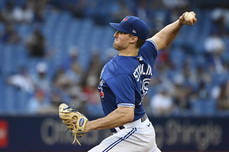 Toronto Blue Jays starting pitcher Ross Stripling throws to a Cleveland Indians batter during the first inning of a baseball game Thursday, Aug. 5, 2021, in Toronto. (Jon Blacker/The Canadian Press via AP)
