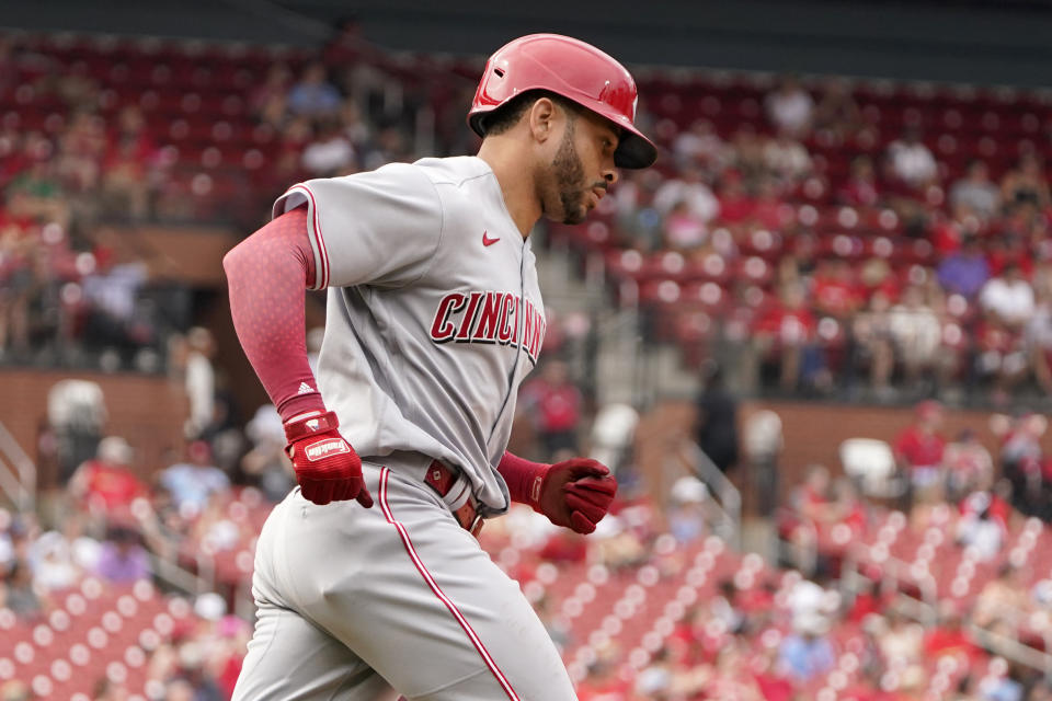 Cincinnati Reds' Tommy Pham rounds the bases after hitting a solo home run during the eighth inning of a baseball game against the St. Louis Cardinals Sunday, June 12, 2022, in St. Louis. (AP Photo/Jeff Roberson)