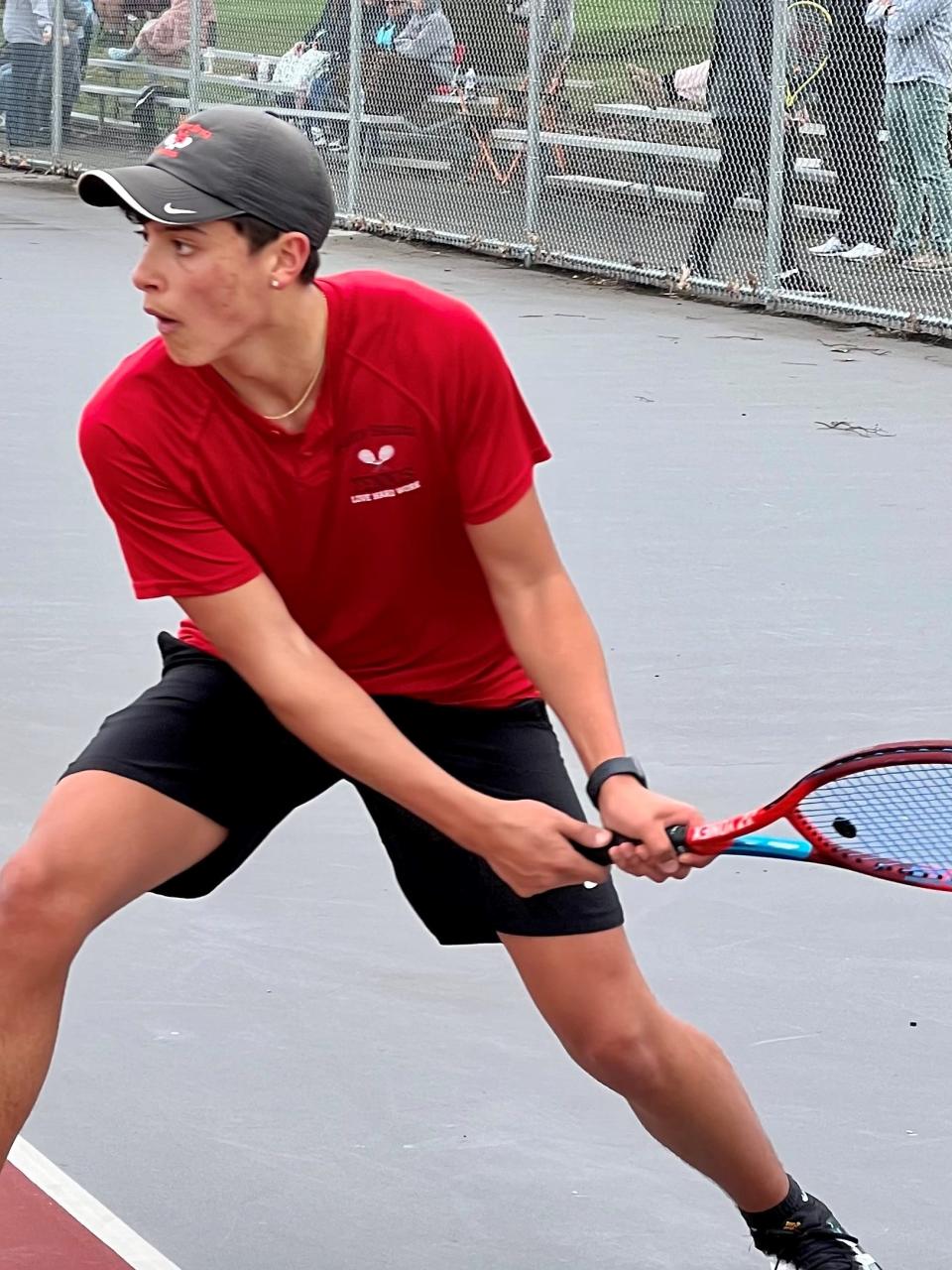 Marion Harding's Mateusz Lisiecki looks to return a shot during a first singles match with River Valley earlier this year at Grant Middle School.