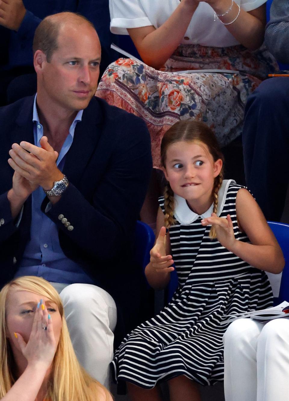 Princess Charlotte watching a swimming competition