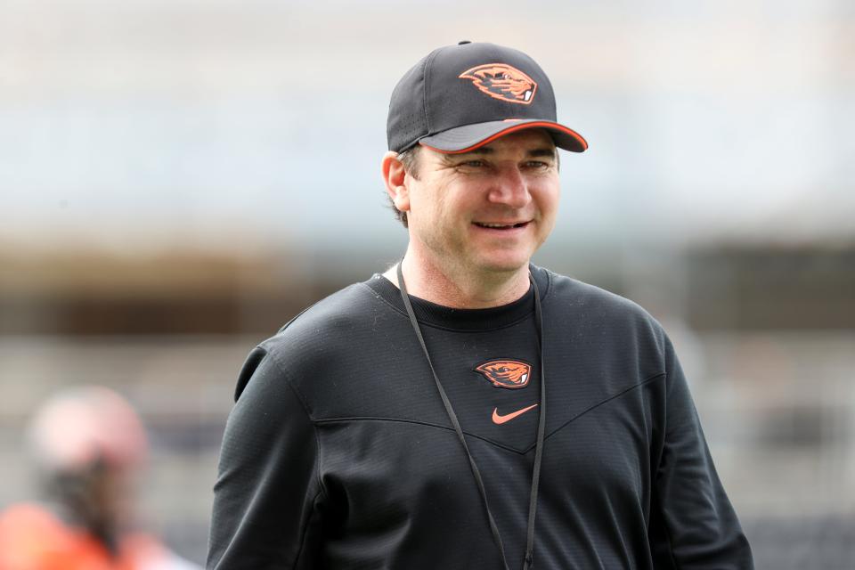 Oregon State head coach Jonathan Smith walks the field before the spring showcase at Reser Stadium on April 22 in Corvallis.