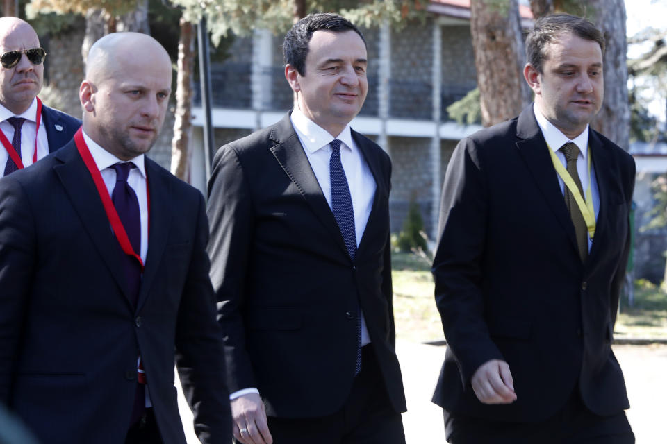 Kosovo's Prime Minister Albin Kurti, center, walks at the arrival to a meeting with EU High Representative for Foreign Affairs and Security Policy Josep Borrell and EU Special Representative Miroslav Lajcak, at North Macedonia's lakeside resort of Ohrid, on Saturday, March 18. 2023. Western officials are hoping for progress this weekend in EU-mediated talks between Serbia's and Kosovo's leaders, in a new attempt to ease decades of tensions between the Balkan wartime foes and solve one of Europe's longest standing disputes. (AP Photo/Boris Grdanoski)